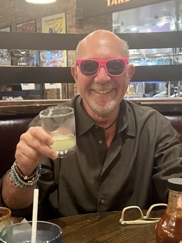 Mitch smiling at dinner